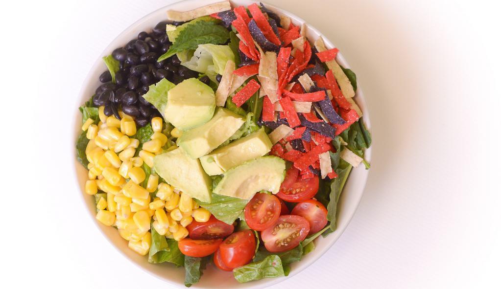 My Southwest Salad · 398 cals. Romaine, Cajun grilled chicken, baby kale, corn, black beans, grape tomatoes, avocado, red onions, shredded cheddar, cilantro and tortilla strips. Chipotle lime vinaigrette.