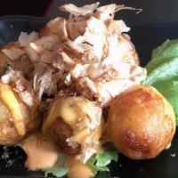 Takoyaki · Batter made from octopus and shapped into a ball. ball-shaped octopus dumpling.