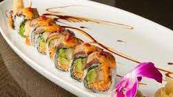 Flying Fire Dragon Roll · Inside shrimp tempura, spicy crab meat, and avocado. Outside sizzling steak with chili and s...