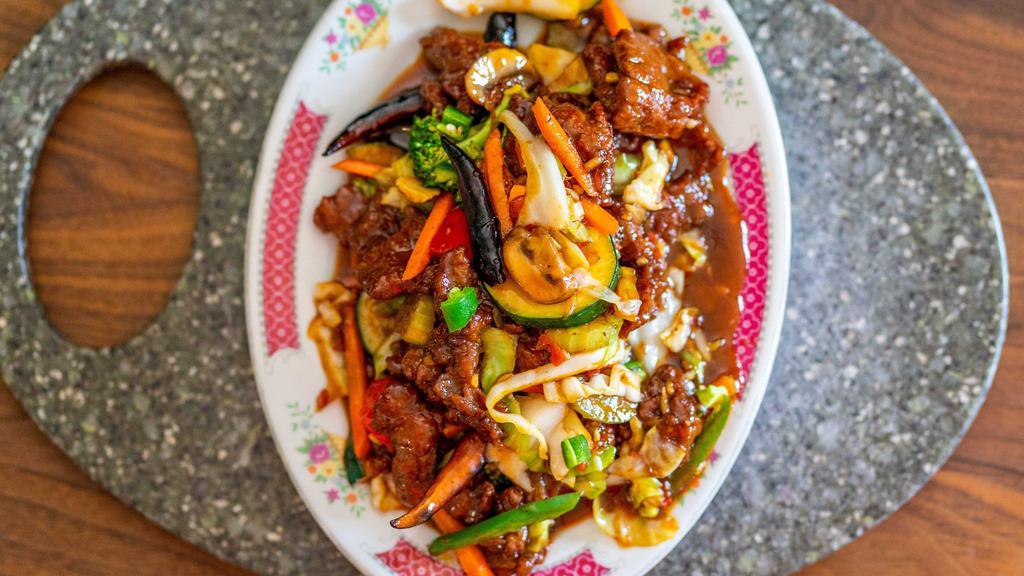 Szechuan Beef · ***Comes spicy with chili peppers***