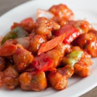 Sweet And Sour Chicken · Served with choice of 2 appetizers and pork fried rice.