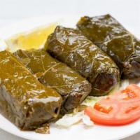 Yaprak Sarma · Grape leaves stuffed with rice, herbs, spices, parsley, and onion.