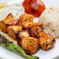 Tavuk Kebab · Chicken kebab (8 cubes) charcoal broiled tender cubes of marinated chicken with chef's seaso...