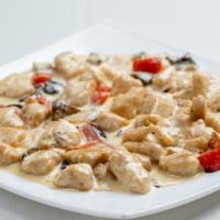 Samdan Special · Breast of chicken in white wine, heavy cream sauce and a hint of garlic. It is served with r...