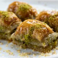 Baklava · (4 pieces in an order) flaky pastry squares filled with crushed pistachios, cinnamon and hon...