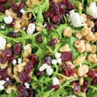 Cranberry Nut Salad · Romaine and spring mix lettuce topped with dried cranberries, chopped apple, candied pecans,...