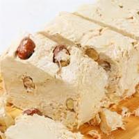Halva Almond · This loaf of halva pairs perfectly with your coffee or tea. A rich, slightly sweet treat mad...