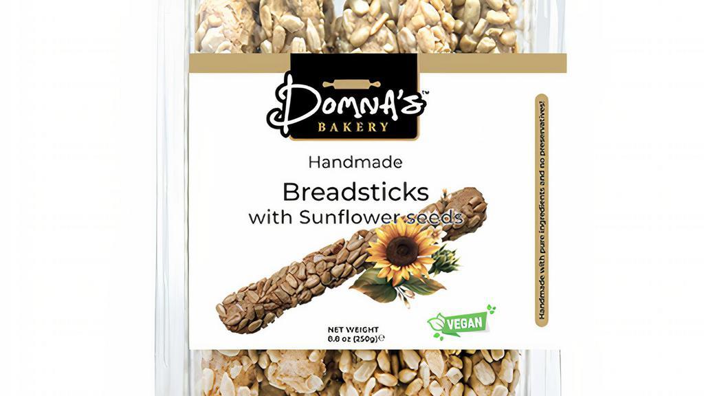 Breadsticks W/ Sunflower Seeds · These simple and delicious breadsticks with sunflower seeds are a perfect crunchy snack for any time of the day. Simple, natural ingredients without any preservatives and vegan for everyone to enjoy.