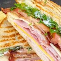 Classic Sandwich · Ham or turkey and cheese, add fresh lettuce & tomato, served with chips
