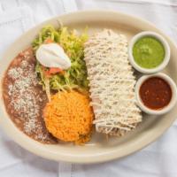Burrito · Large flour tortilla stuffed with your choice of meat, Monterey Jack cheese, rice, and refri...