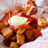 Patatas Bravas · Fried Idaho potato cubes, brava sauce, and alioli