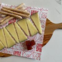 Tapa De Queso Manchego · Manchego cheese aged for 3 months served with quince paste, 2 ounce serving