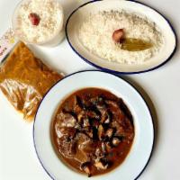Diy Fricando Kit · Traditonal Catalan beef stew; mushrooms served with garlic sautéed white rice. Reheat and en...