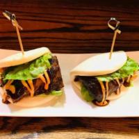Pork Buns · Chashu pork with fresh cucumber, spicy mayo, and special bun sauce.