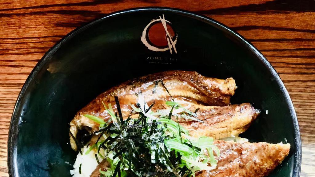 Unagi Don · Japanese style EEL over rice with special sauce .