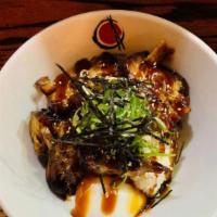 Chashu Don · Pork over rice, poached egg, scallion, nori flakes, and chef special sauce.