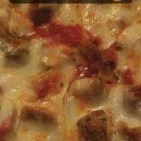 Chicken Parmesan Pizza · Our famous house chicken parm made into a pizza. Gotta try it!.