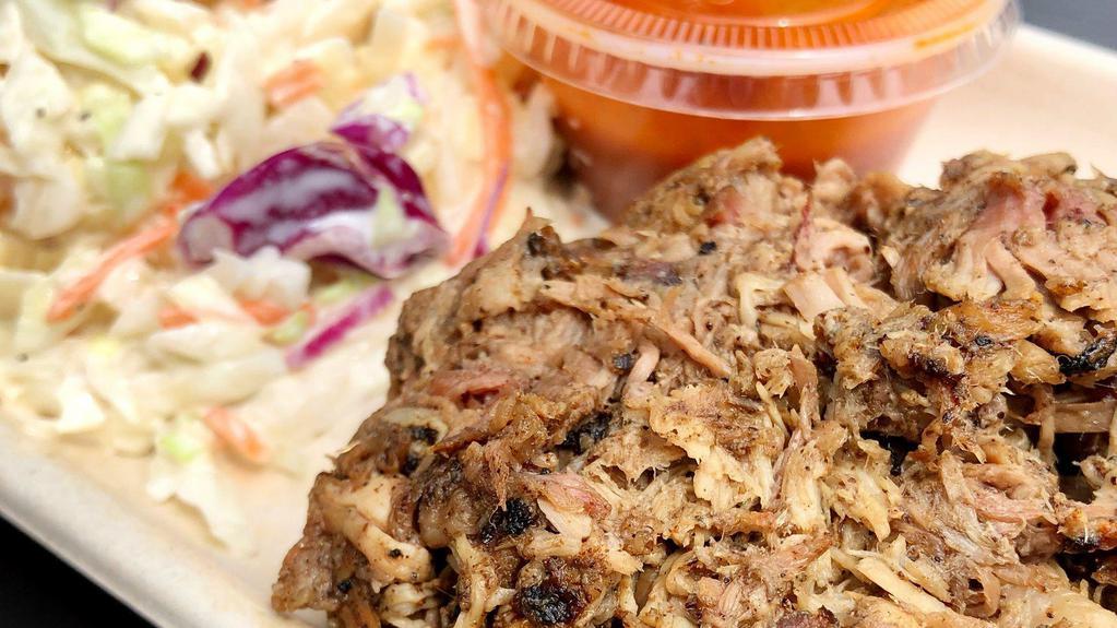 Pulled Pork · Shredded, pecan smoked heritage breed bone-in pork butt served with our King Sauce.
