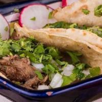 Tacos · 4 Soft shell tacos filled with your choice of meat. Topped with onion & cilantro. Accompanie...