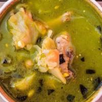 Caldo De Pollo · Chicken soup with vegetables accompanied with lime, onions & 5 tortillas.