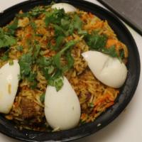 Chawals2 Special Biryani · Basmati rice cooked with chicken, baby goat,lamb, shrimp, eggs.
