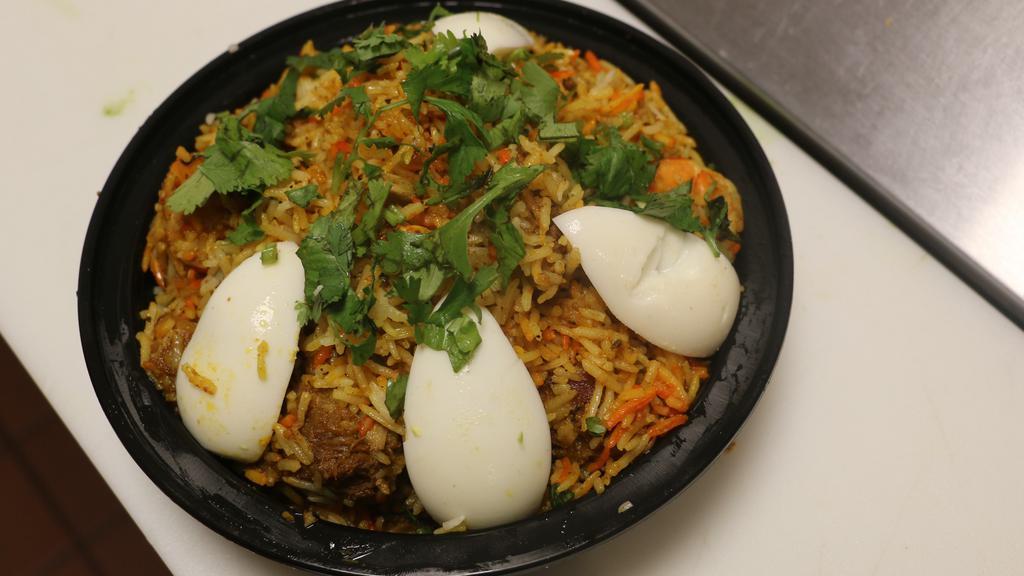 Chawals2 Special Biryani · Basmati rice cooked with chicken, baby goat,lamb, shrimp, eggs.