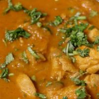 Chicken Curry (Non Veg) · Boneless chicken in masala curry.