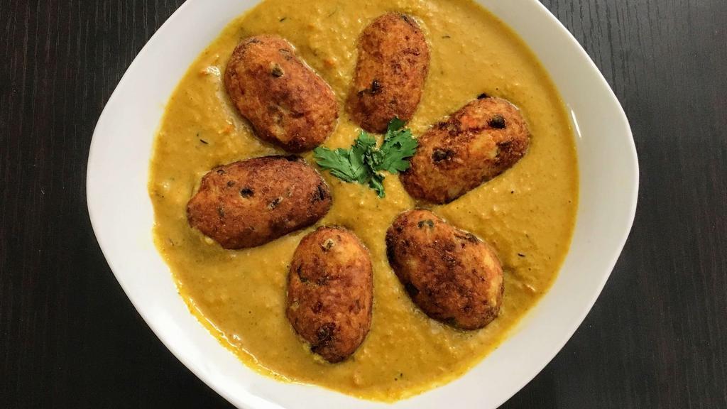 Malai Kofta · Paneer(cottage cheese)and potatoes dumpling cooked in onions and tomato gravy with spices and herbs.
