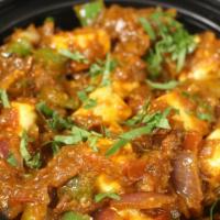Kadhai Paneer (Veg) · Paneer onion and green peppers combo in masala gravy.