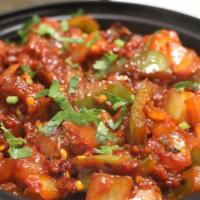 Chilli Chicken  · Chicken marinated and fried and then cooked in garlic chilli thick masala sauce.