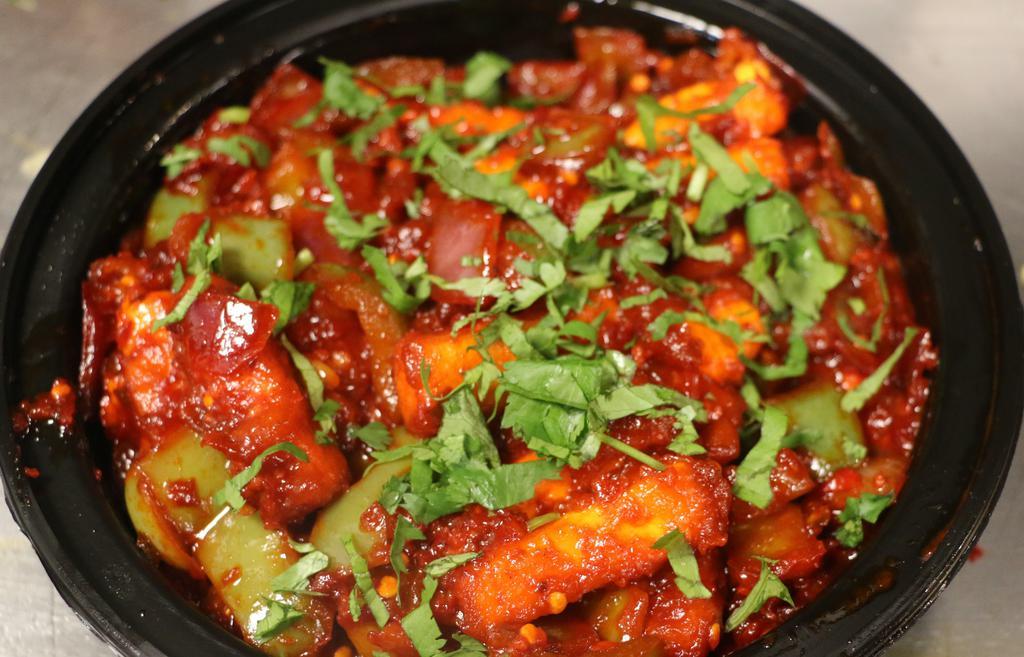 Chilli Paneer · Paneer(cottage) Cheese marinated and fried and then cooked in garlic chilli thick masala sauce.