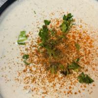 Large Dahi Raita · Yogurt, cucumber, onions and herbs and spices side