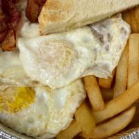 2 Eggs Breakfast Platter · Two eggs your choice of Sunnyside, over easy, or scrambled with home fries or French fries w...