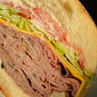 Meat Lover Specialty Sandwich · Boar’s head® roast beef, boar’s head® American cheese, lettuce, tomatoes, and boar’s head® r...