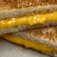 Grilled Cheese · White toasted bread with boar’s head® American cheese.