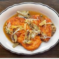 Chicken Milanese · Milanese with lemon, capers, butter, poached fennel, cardoons, and chicken jus