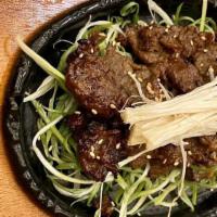 Bulgogi · Soy sauce marinated beef rib-eye with vegetables. Does not come with rice.