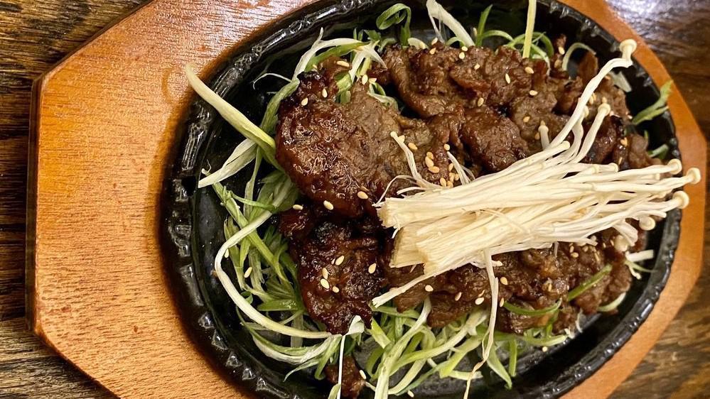 Bulgogi · Soy sauce marinated beef rib-eye with vegetables. Does not come with rice.