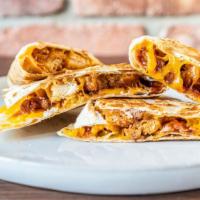 Honey Bbq Chicken Quesadilla · Crispy chicken tossed in honey BBQ sauce with bacon and cheddar.