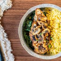 Grilled Chicken Over Sauteed Spinach With Mushrooms · Served with rice.