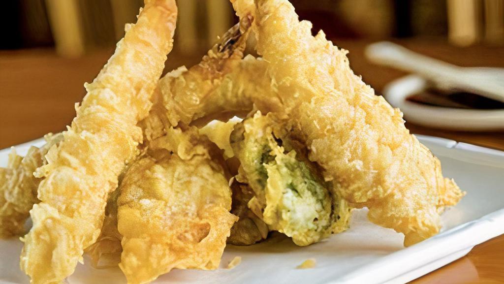 Shrimp Tempura Entree · Eight pieces vegetable and five pieces shrimp tempura. Served with soup and salad.