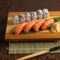 Party Tray A · Shrimp tempura roll, paul's roll, green dragon roll, california roll, soft shell roll and po...