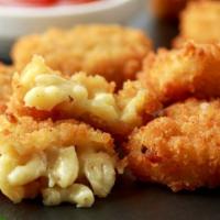 Mac And Cheese Bites · Fried macaroni and cheese balls.