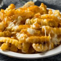 Disco Fries · French fries topped with gravy and cheese.