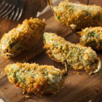 Jalapeño Poppers · Four breaded jalapenos stuffed with cream cheese.