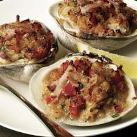 Clams Casino · Stuffed clams with sautéed crab, meat and shrimp. Almejas casino.