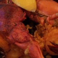 Paella Catalla For 1 Person · A medley of lobster, clams, mussels, scallops, shrimp and chicken in yellow saffron rice