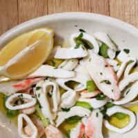 Insalata Di Mare · Seafood salad with shrimp, calamari, scungilli, baby octopus, and crabmeat.