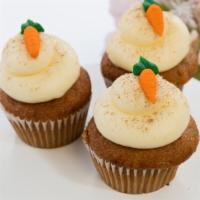 Carrot Cupcake · Classic carrot cake filled and topped with whipped cream cheese buttercream and a sprinkle o...