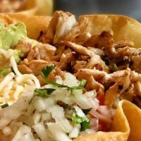 Grilled Chicken Taco Bowl · Crispy flour tortilla in shape of a bowl with Romaine, Mozzarella cheese, sour cream, pico d...